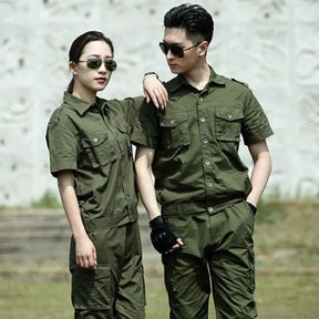 Two models wearing a summer green cotton work suit designed for welding protection, showcasing functionality and style.