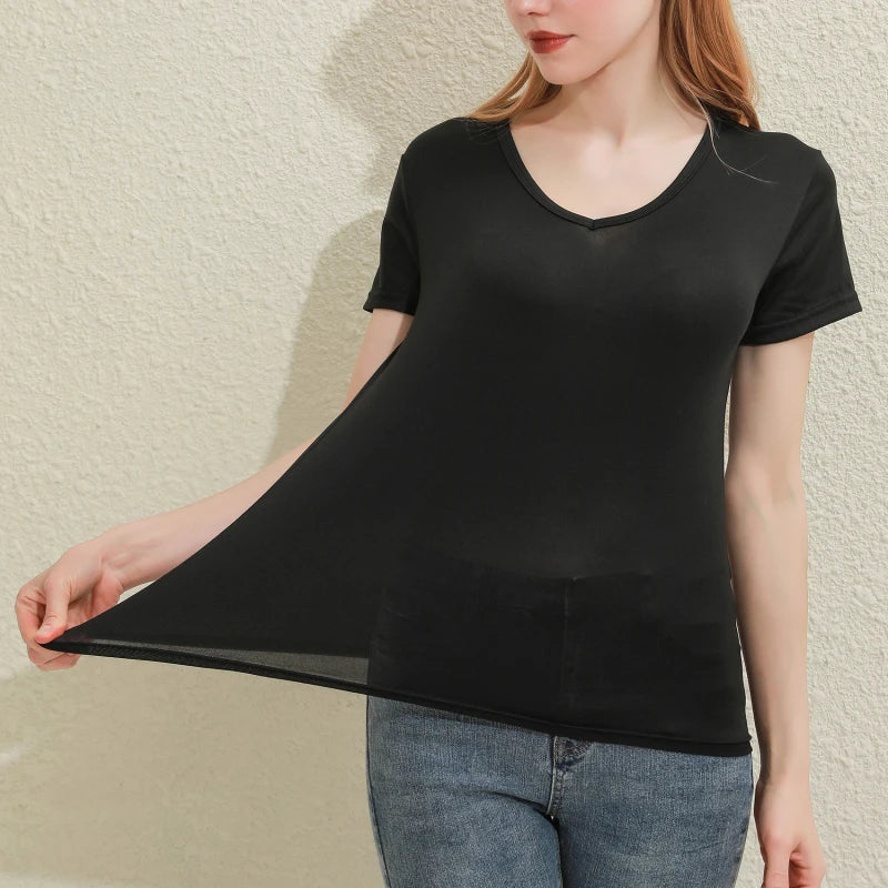 Women wearing a slim fit black cotton V-neck tee, showcasing its lightweight and breathable design.