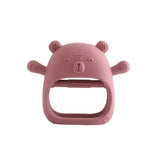 Pink silicone baby teether glove shaped like a bear, soft and non-toxic for soothing teething infants.