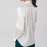 Back view of SatinGrace™ long sleeve silk shirt, showcasing its premium mulberry silk and loose fit design.