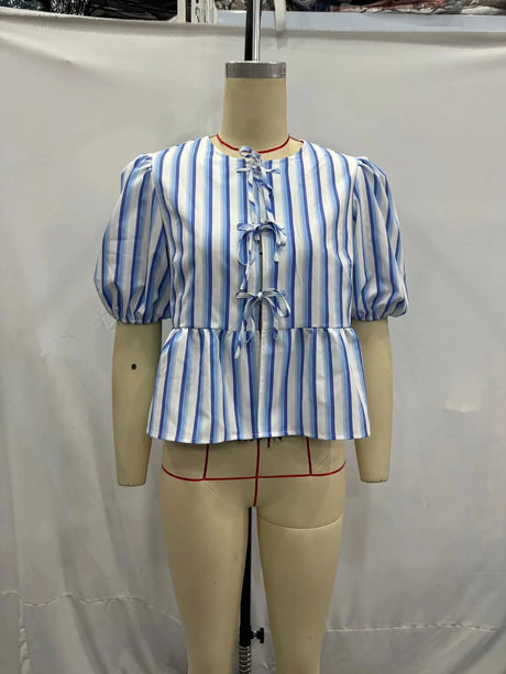 Blue and white striped blouse with lace-up detail and short puff sleeves, showcasing TRAFZA vintage style.