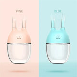 Baby nose cleaner tool in pink and blue colors, ideal for safe nasal suction for infants, made from silicone.
