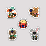 Colorful set of reusable child forehead temperature stickers featuring animals for easy temperature measurement.