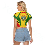 Cropped women’s t-shirt featuring the Zimbabwe flag design on the back, paired with denim shorts.