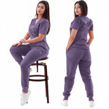 Breathable elastic medical scrub sets in purple for women, perfect for healthcare professionals in hospitals and salons.