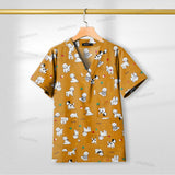 Short sleeve printed nursing scrub top with cute dog patterns, breathable cotton fabric, perfect for healthcare and pet grooming.