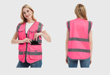 High visibility pink safety vest for women with reflective tape and multiple pockets, ideal for work uniforms.