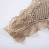 Close-up view of the intricate lace detailing on a WireFreeFlex™ seamless tank bra top in beige.