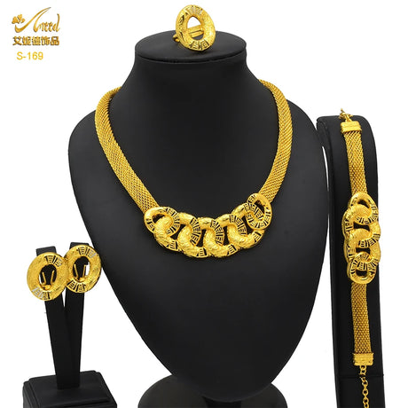 Luxury Indian bridal jewelry set featuring a 24K gold necklace, earrings, ring, and bracelet in Bohemian style.