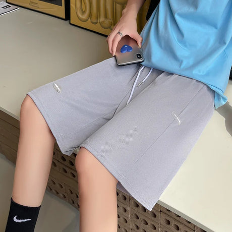 Plus size wide leg maternity summer capris, loose fit, in natural color, ideal for comfort during pregnancy.