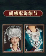 Miao embroidery suit featuring traditional silver jewelry and a detailed headdress, ideal for festivals and cultural celebrations.