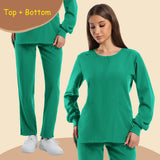 Women's long sleeve jogging style scrubs in vibrant green color, featuring a top and bottom set suitable for medical professionals.