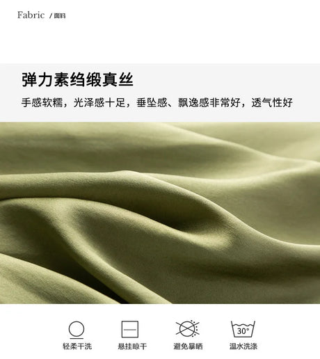 Close-up of soft, stretchy satin fabric in olive green, showcasing its luxurious texture and feel.