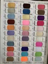 Color swatch chart showcasing a variety of fabric options including shades of pink, blue, purple, and neutral tones.
