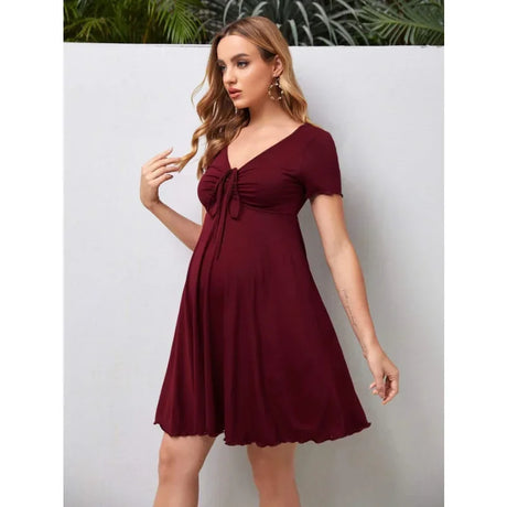 Pure Color V-Neck Maternity Dress in burgundy, perfect for summer, knee-length, stylish and comfortable for expectant mothers.