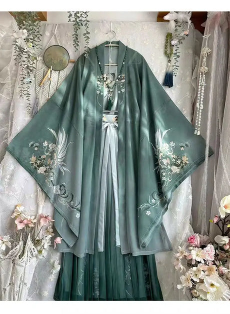 Song Dynasty Hanfu set featuring a green chiffon top and skirt with floral prints, ideal for women in all seasons.