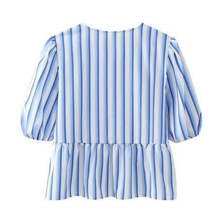 Back view of BowChic™ Stripe Lace-Up Blouse with blue and white stripes, short puff sleeves, and peplum style.