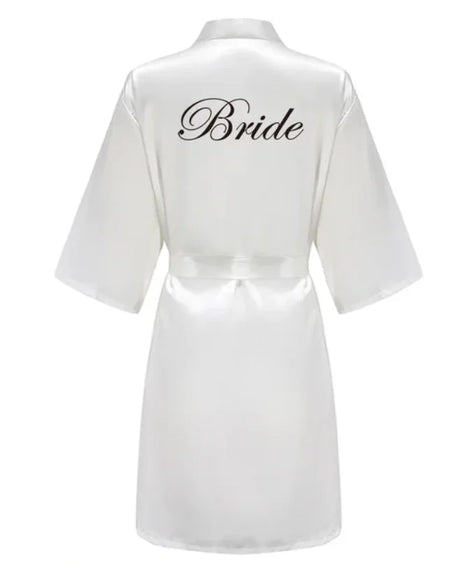 White satin robe with 'Bride' text on the back, perfect for bridal parties and wedding preparations.
