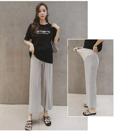 Breathable adjustable waist maternity pants in natural gray color, featuring a wide leg design, ideal for summer wear.
