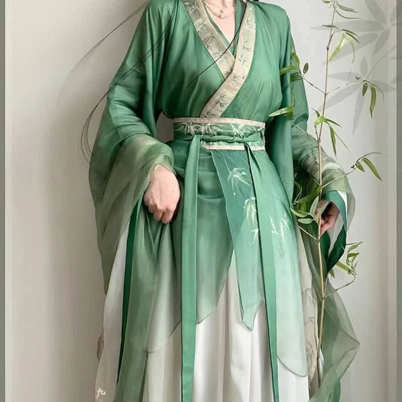 Bamboo green Hanfu dress for women, featuring layered sleeves and floral details, perfect for parties and traditional events.