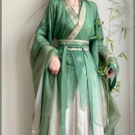 Bamboo green Hanfu dress for women, featuring layered sleeves and floral details, perfect for parties and traditional events.