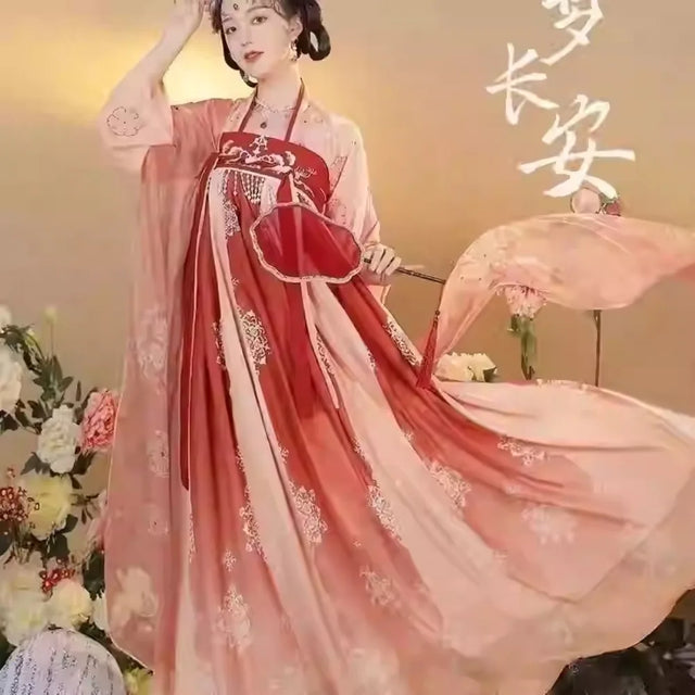 Elegant Hanfu traditional dress in shades of pink and red, perfect for parties and cultural celebrations.