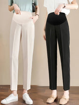 Formal black and beige maternity pants, perfect for summer work wear, featuring a stylish straight fit and comfortable design.