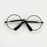 Round black glasses for newborn photography accessories, perfect for baby photo shoots and unisex styling.