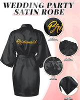 Elegant black satin bridesmaid robe featuring 'Bridesmaid' in gold, perfect for wedding parties and bridal showers.