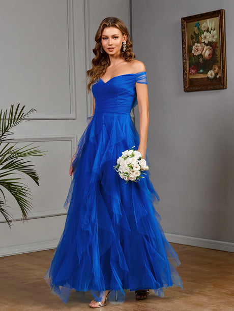 Stunning blue multi-layered gown, perfect for bridesmaids or formal events, featuring off-the-shoulder design and tulle fabric.