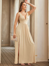 Bridesmaid evening gown featuring a V-neck design, split backless style, and pleated satin fabric in a floor-length silhouette.