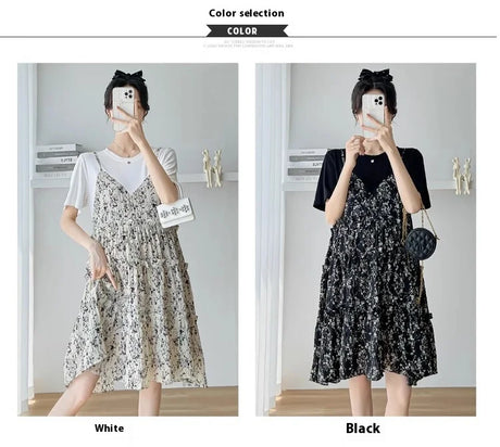 Elegant maternity dress in white and black floral patterns, showcasing knee-length design and stylish layering options.