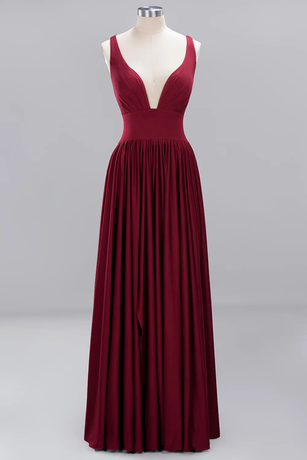 Bridesmaid evening gown in burgundy, V-neck design with pleats and floor-length silhouette.