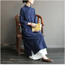 2025 Korean Hanbok Dress in floral design, modeled by a woman seated in traditional attire with a book.