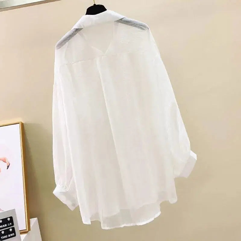 SunVeil™ sheer chiffon sunscreen shirt in white, featuring a loose fit and lightweight design, ideal for spring and summer.