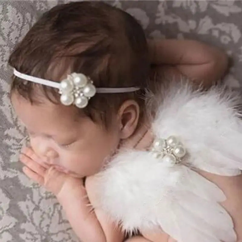 Newborn baby in angel wing costume with headband, perfect for photography props and shooting accessories.