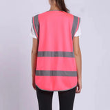 Hi-Vis pink safety vest with reflective stripes, designed for unisex workwear in construction and outdoor environments.
