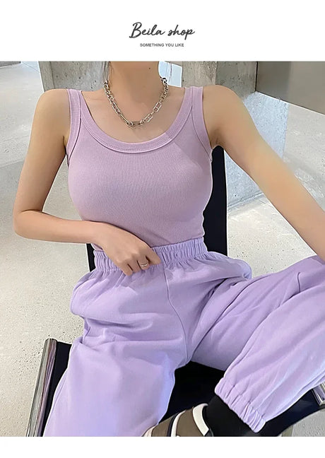 RetroRib™ vintage ribbed tank top in lavender, styled with matching pants for a trendy streetwear look.