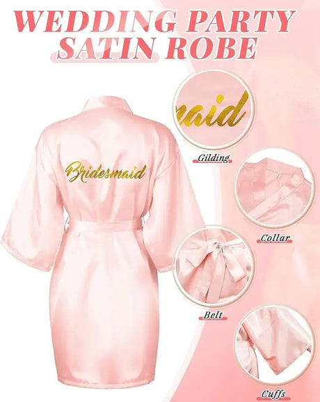 Pink satin bridesmaid robe featuring gilded lettering, collar, belt, and cuffs for wedding party elegance.