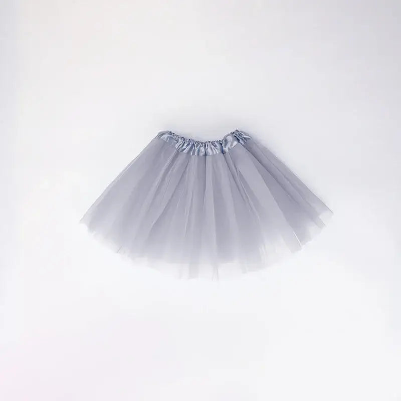 Light gray tulle skirt for girls, perfect for dresses and playful outfits, featuring an elastic waist for comfort.