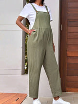 Adjustable maternity overalls in olive green, featuring a loose fit and stylish design for pregnant women.