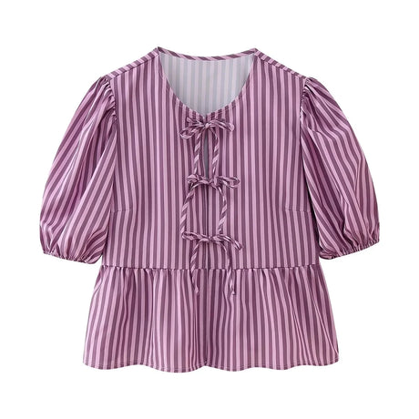 BowChic™ stripe lace-up blouse by TRAFZA, featuring short sleeves and a chic peplum design.