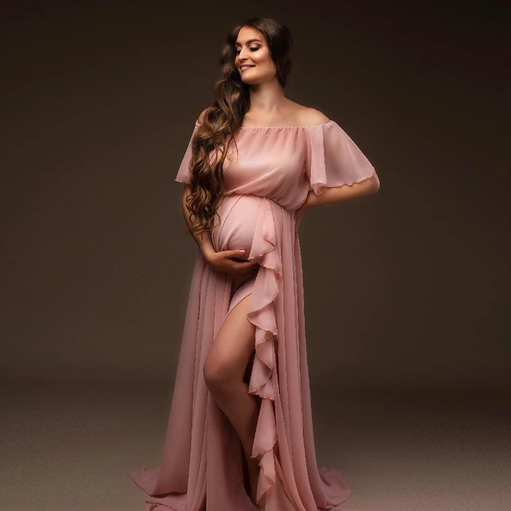 Chiffon ruffle sleeve maternity dress in blush color, perfect for summer photoshoots, showcasing a pregnant model.