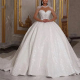 Sparkle African Wedding Ball Gown with lace-up back and beaded details, floor-length design in white.
