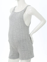 Sleeveless ribbed maternity jumpsuit in gray, featuring a loose fit and pockets, ideal for casual summer wear.