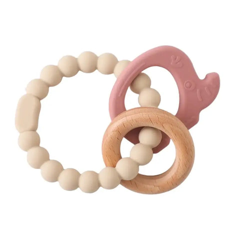 Baby teether gloves made of soft, safe, non-toxic silicone in beige and pink, designed to soothe teething pain for infants.