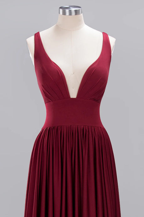 V-neck backless bridesmaid evening gown in burgundy, featuring pleated floor-length skirt and sleeveless design.