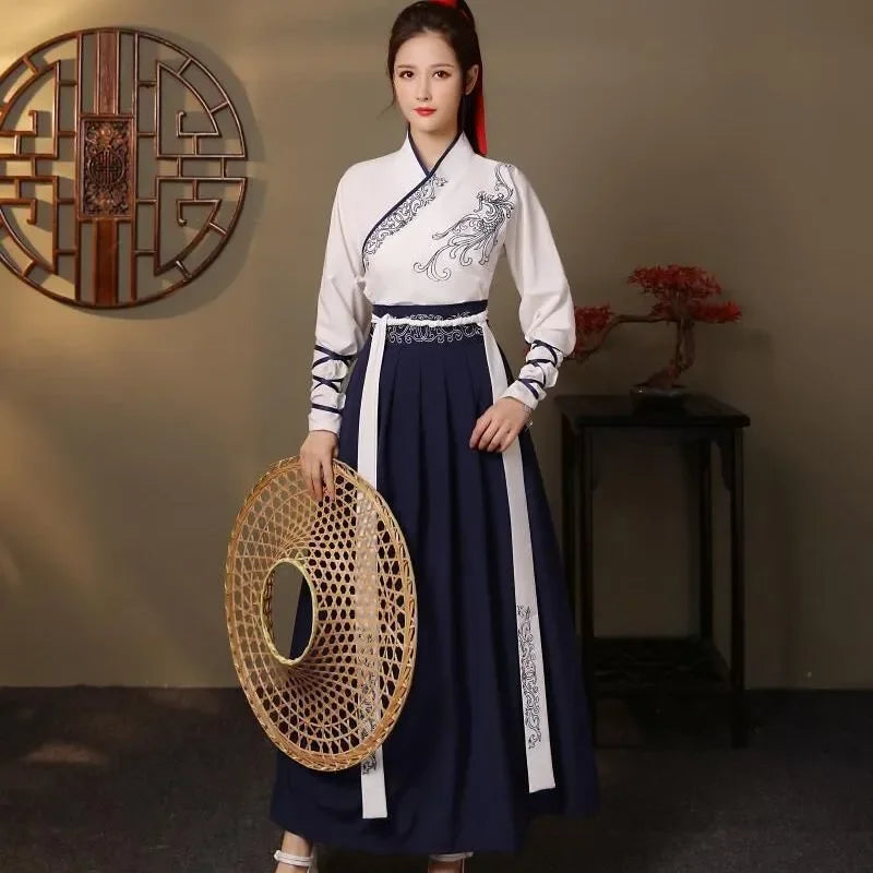 Streetwear casual Hanfu dress featuring a white top with dragon embroidery and a flowing navy skirt, perfect for cultural events.