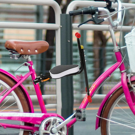 Kids electric bike saddle seat attached to a pink bicycle, showcasing a comfortable backrest and design for ages 12 and up.