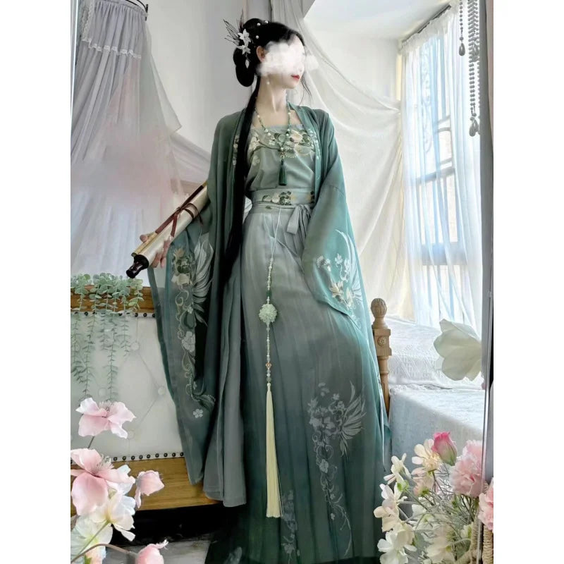 Elegant female wearing a Song Dynasty Hanfu set with floral designs, chiffon fabric, and flowing skirt.
